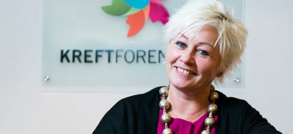 MILLIONDRYSS: Anne Lise Ryel, generalsekretær i Kreftforeningen, deler ut penger til norske kreftforskere. Foto: Kreftforeningen