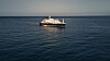 Det nederlandske cruiseskipet MV Hondius ligger for anker på rolig hav utenfor Kapp Verde.